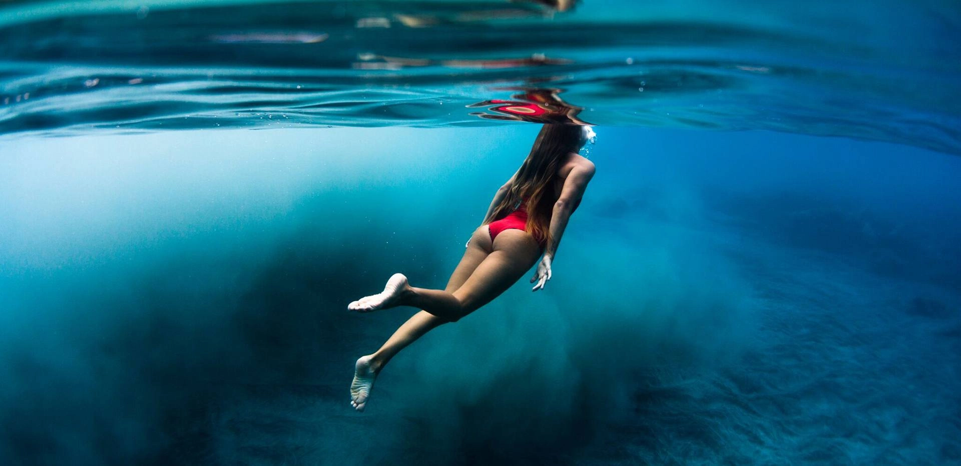Women Diving Blue Ocean Rapturecamps