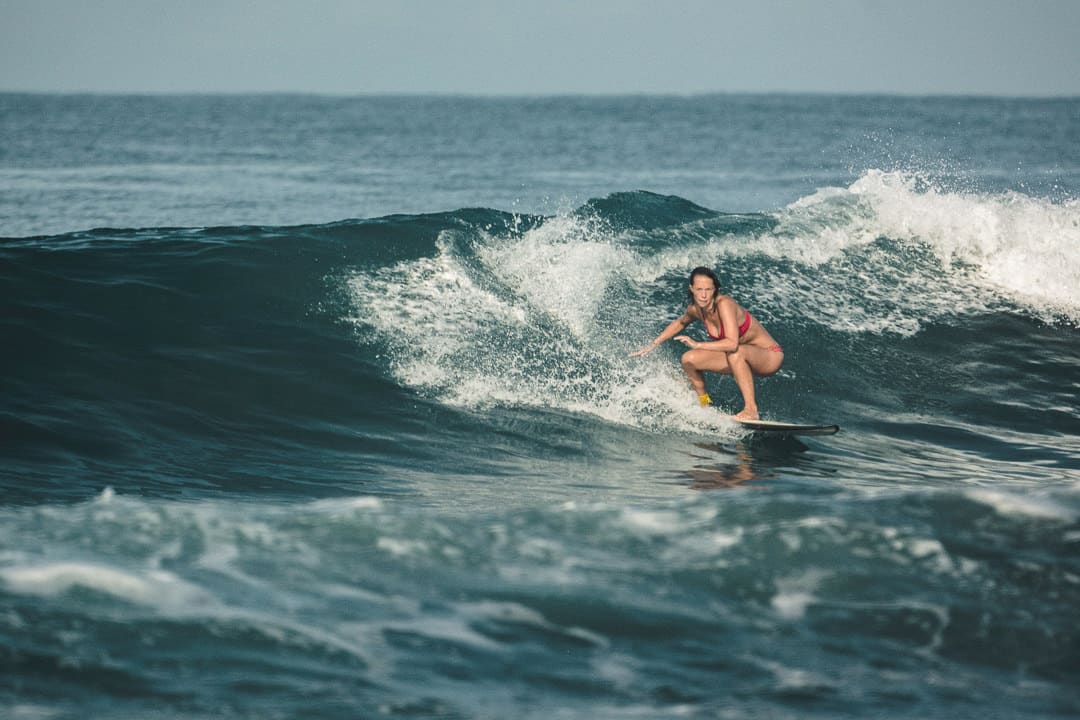 Surfer making top turn trick in Playa Avellanas