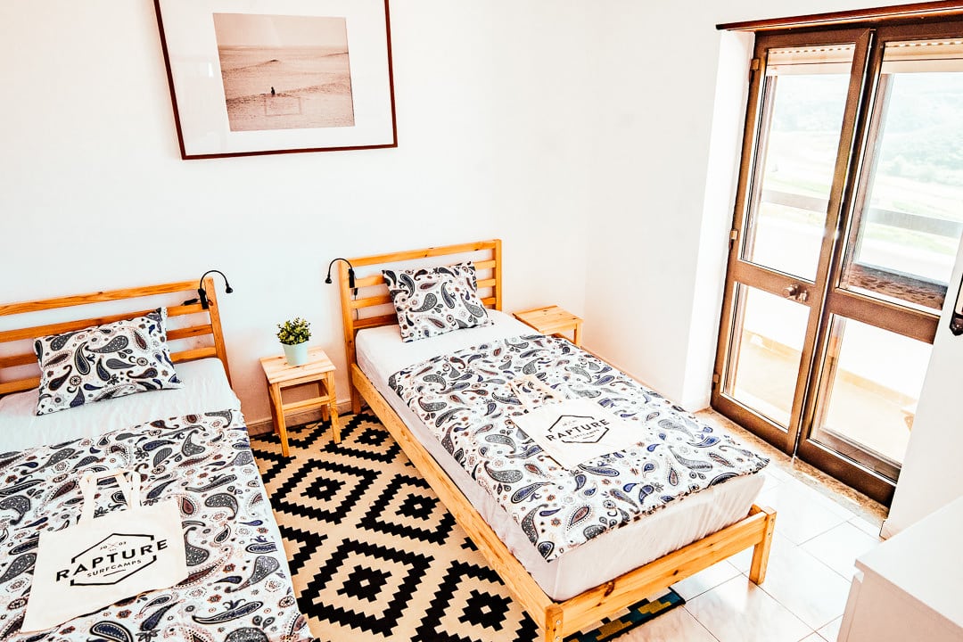 Two twin beds in a room with view at ericeira