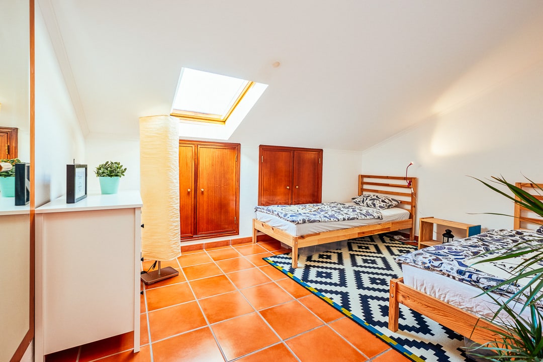 Two twin beds in a room at ericeira rapturecamps