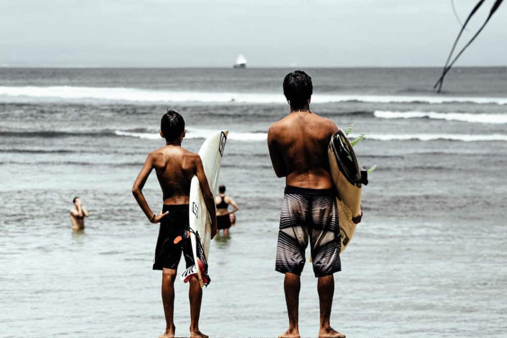 father and son surfing