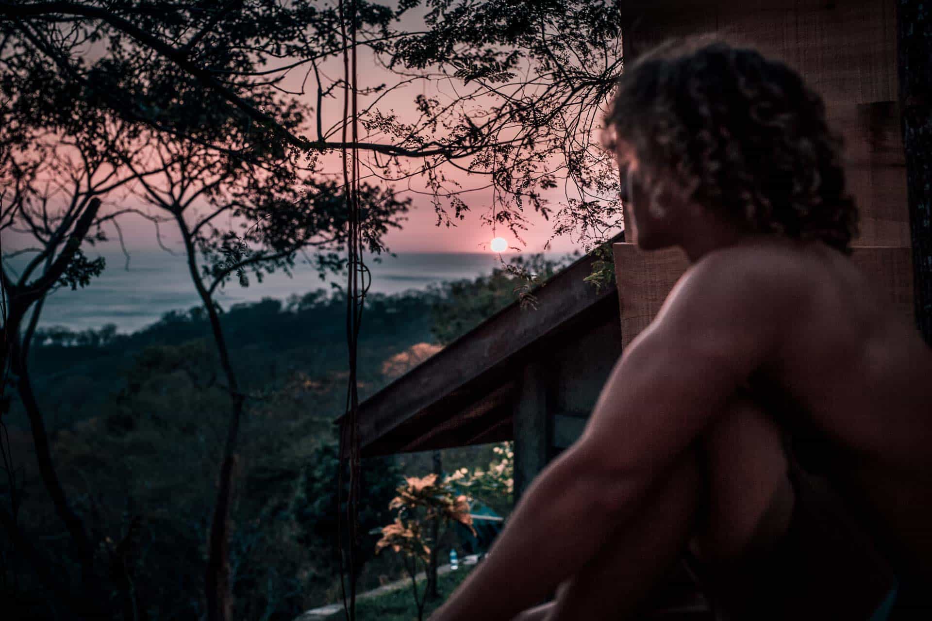 Guy watching the sunset as Rapture Surfcamp Nicaragua