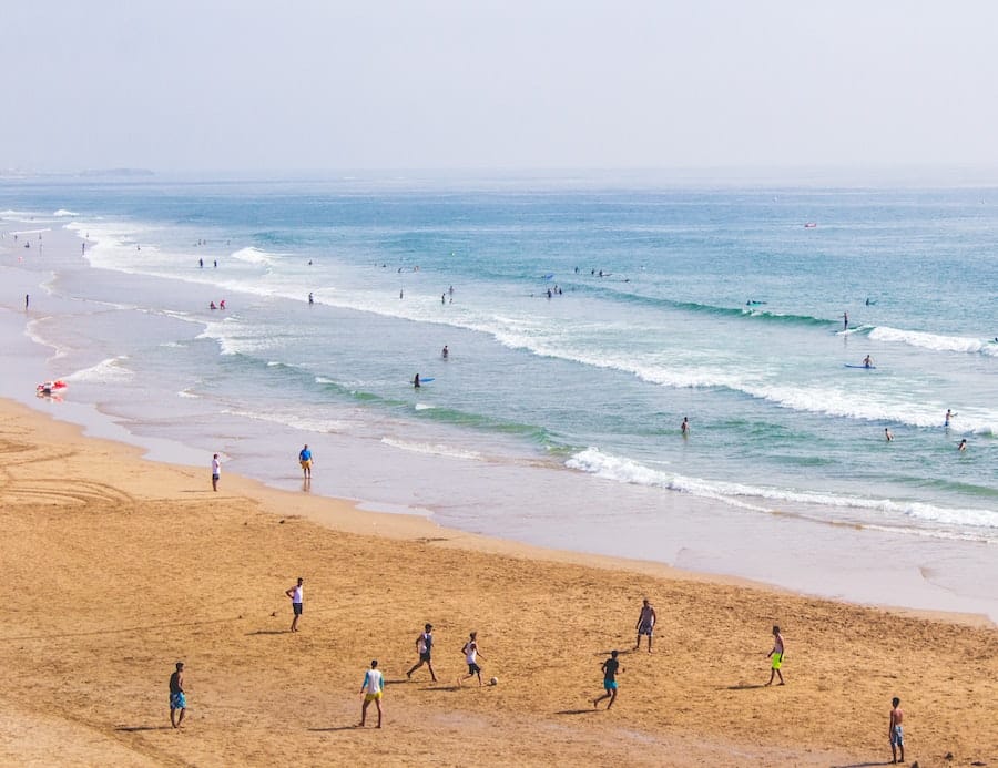 Beach with people in Morocco