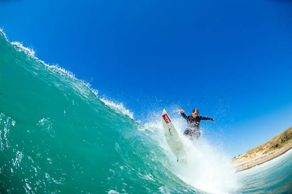 Peson surfing on a big wave