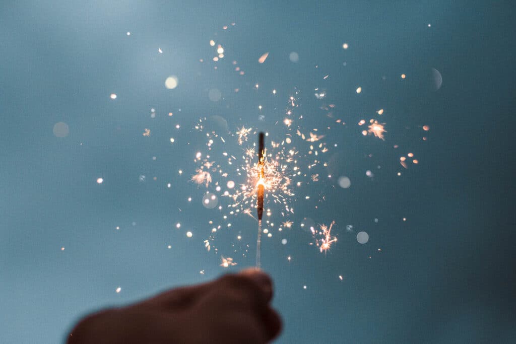 A picture of a lit up sparkler.