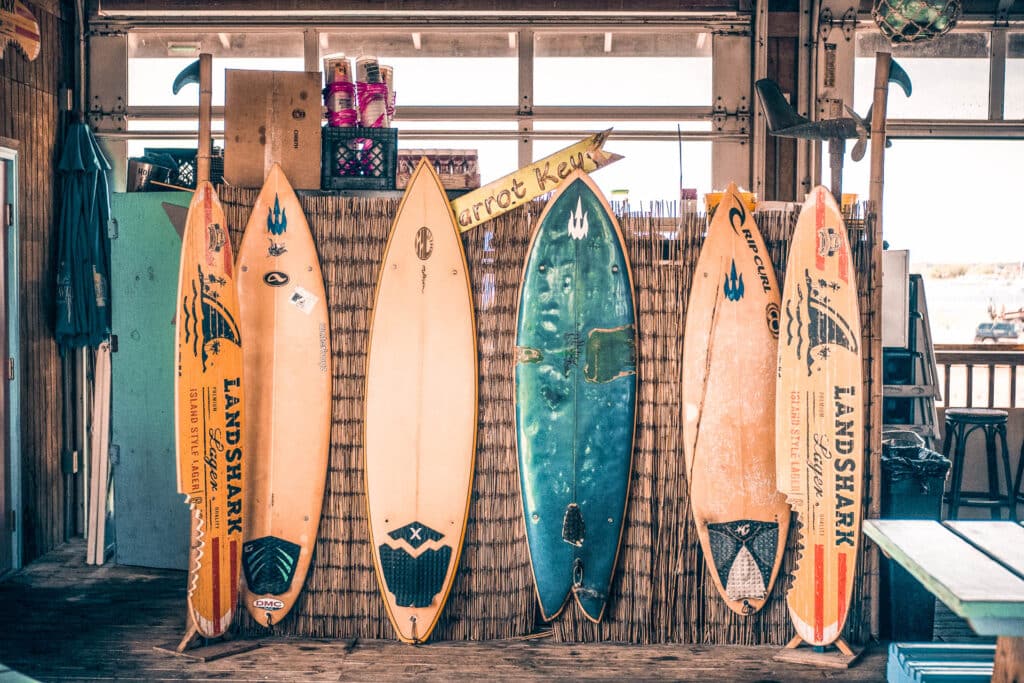 Surf boards lined up indoors