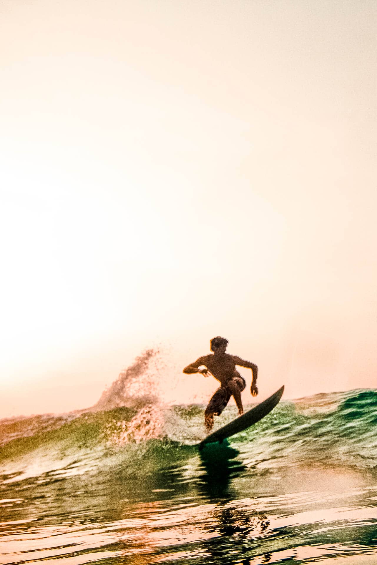A person surfing in the ocean.