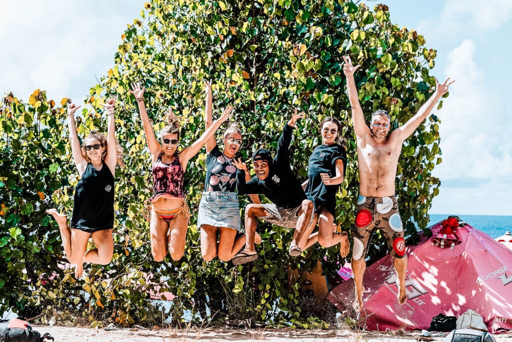 Enthusiastic group of people jumping in the air